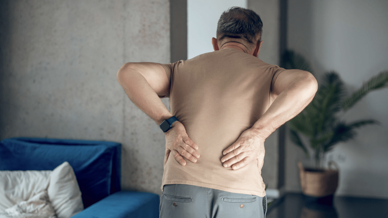 Back pain in the lumbar region in a man
